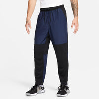 Pantalones de pierna cónica impermeables Nike Unlimited para hombre