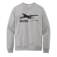 Gray sweatshirt with black airplane graphic and text on a white background