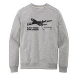 Gray sweatshirt with black airplane graphic and text on a white background