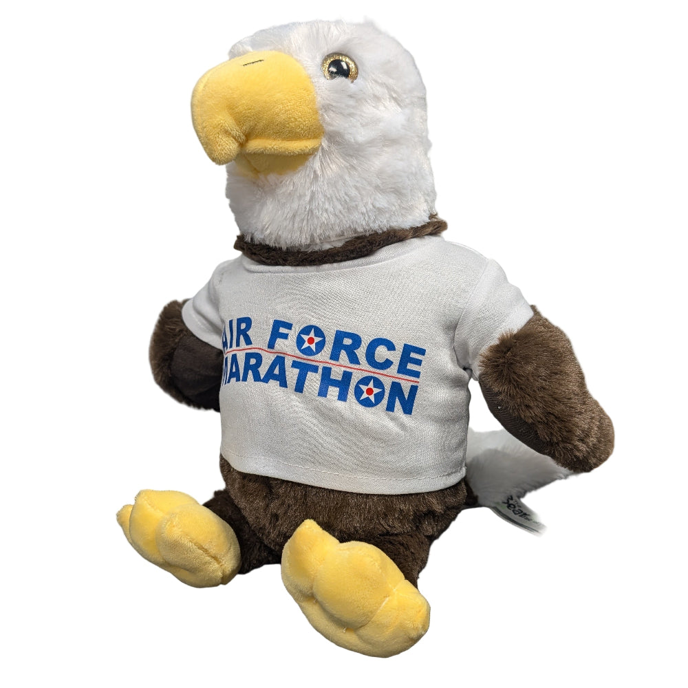 Plush eagle toy wearing a 'Air Force Marathon' t-shirt.
