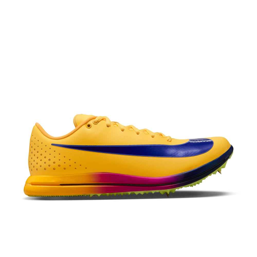 Yellow running shoe with purple and pink accents on a white background